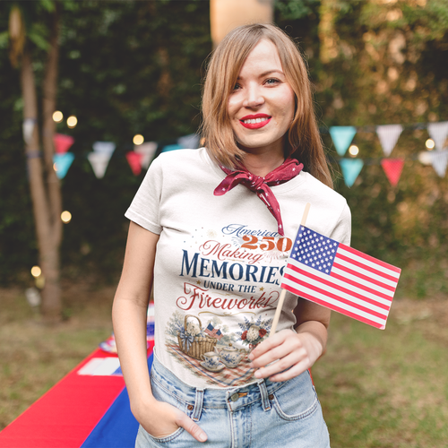 Woman holding an American flag in a decorated outdoor setting with bunting flags and lights.